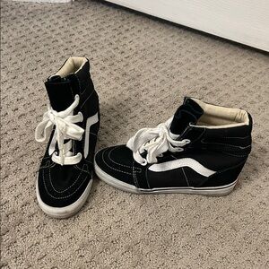 Vans Black and White High-Top Sneakers